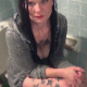 A mature woman with tattoos takes a shit while sitting on a toilet. Many soft plops are heard as she pushes throughout the clip. Presented in 720P HD. 108MB, MP4 file. Over 4 minutes.